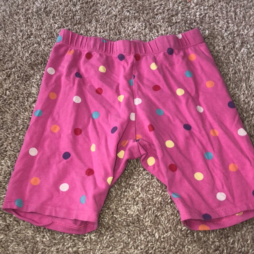 pink polka dotted low legged shorts